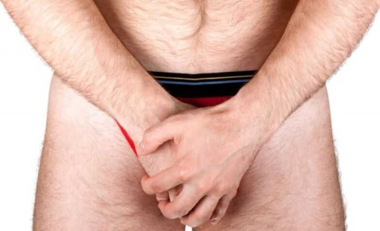 A man massages his penis to increase thickness